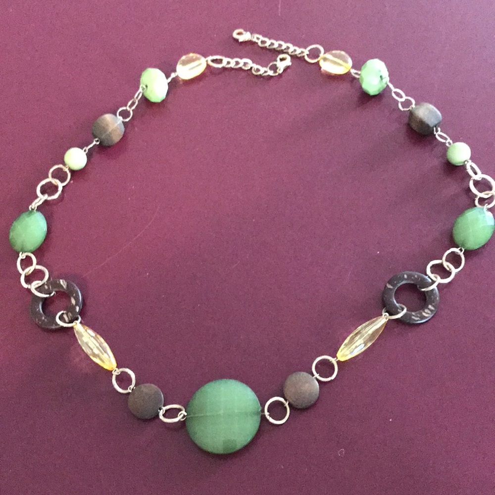 Gold tone necklace with stones